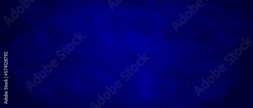 Dark blue abstract background with grunge texture and space for text.