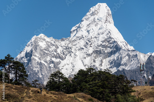 Tourist standing on the hill and looking to beautiful view of Mt.Ama Dablam (6,812 m). Ama Dablam is one of the most beautiful mountains in the world.