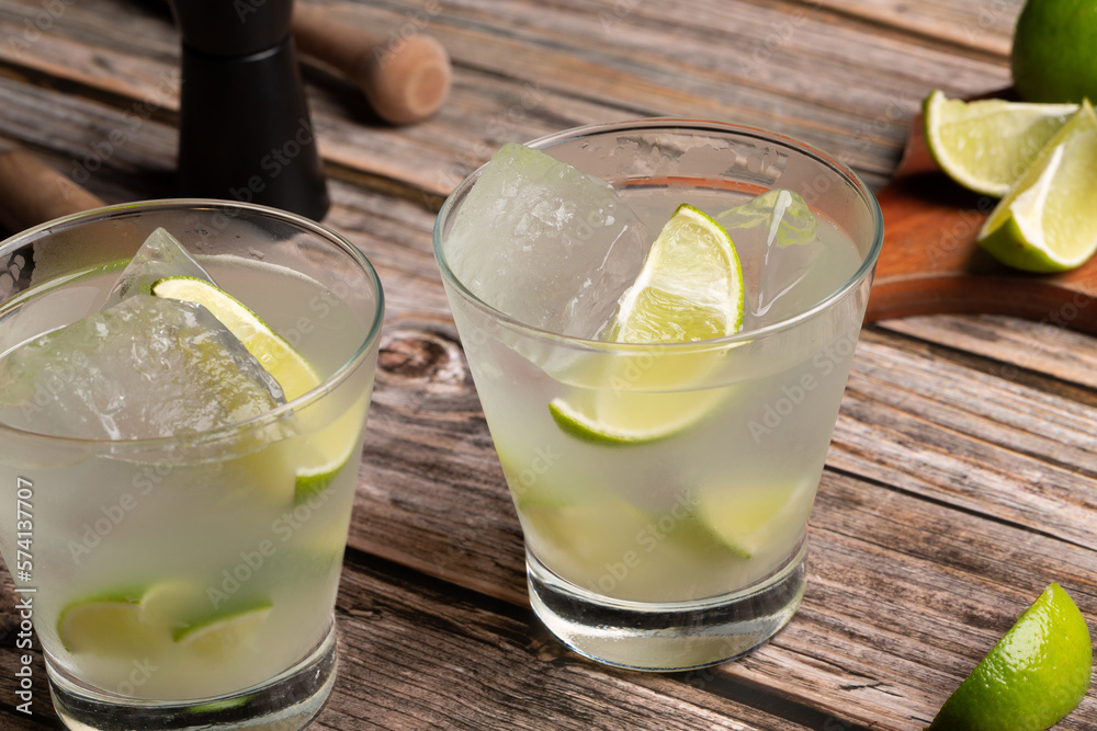 Fototapeta premium Caipirinha cocktail classic Brazilian cachaça, lime and sugar refreshing drink 