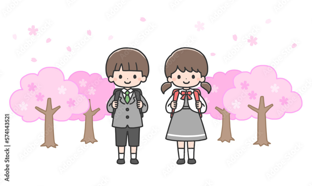 入学式 桜の前に立つ新一年生の男の子と女の子 入学式 桜の前に立つ新一年生の男の子と女の子