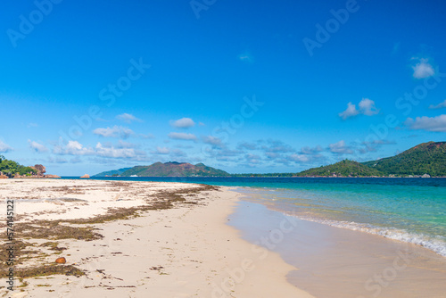 Fototapeta Naklejka Na Ścianę i Meble -  A wild white sand beach on Curieuse island in Seychelles