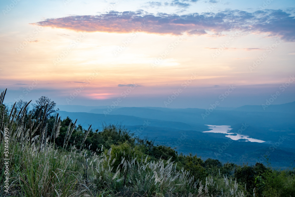 Naklejka premium Sunset view from Phu Pa Po in the province of Loei in Thailand