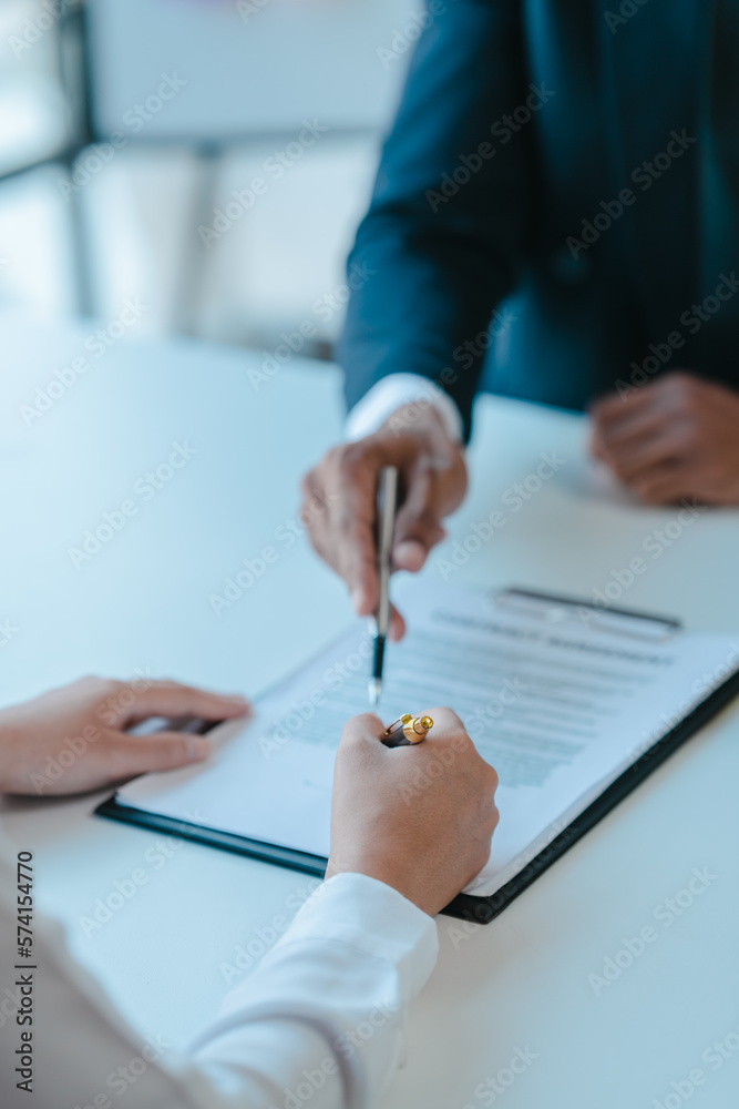 Suggestion to sign a contract, realtor suggestion a new house model assisting client to sign contract agreement with insurance to happy living building, concerning mortgage loan offer Suggestion to sign a contract, realtor suggestion a new house model assisting client to sign contract agreement with insurance to happy living building, concerning mortgage loan offer