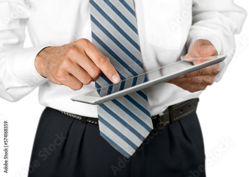 Young business man in suit using digital tablet isolated on white background