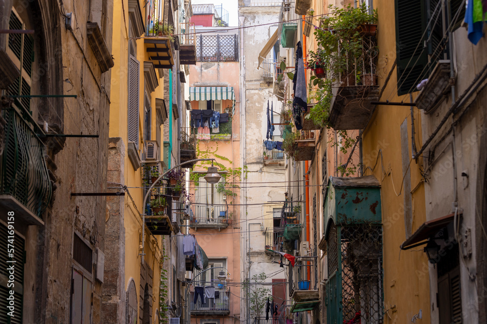 A typical Italian cityscape, colorful buildings, narrow street, Naples, Italy