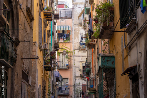 A typical Italian cityscape, colorful buildings, narrow street, Naples, Italy