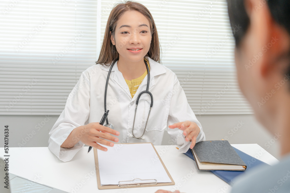 Asian female doctor advice consulting diagnosis and check-up at hospital clinic. Patient explain health problems and symptoms to Professional physician. medical, medicine, treatment, therapy Asian female doctor advice consulting diagnosis and check-up at hospital clinic. Patient explain health problems and symptoms to Professional physician. medical, medicine, treatment, therapy