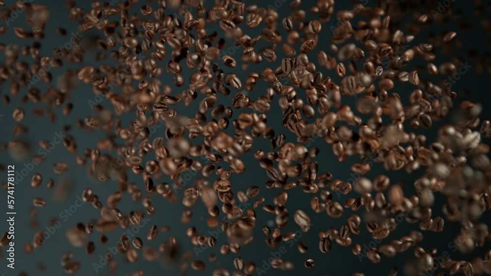 Super Slow Motion Shot of Fresh Coffee Beans Flying Towards Camera on Dark Background at 1000fps.