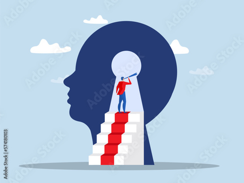 Business vision concept, businessman using telescope to look into the distance Self-discovery , Positive Psychology and Self Awareness