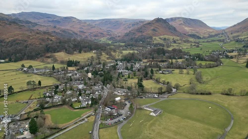 Cinematic cumbrian aerial village landscape, Aerial view of Grassmere, village, town in the English Lake District, UK. photo