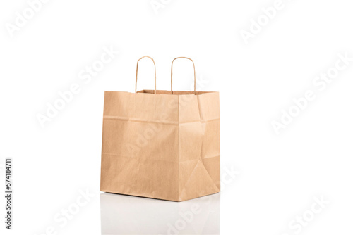 Paper shopping bag on white