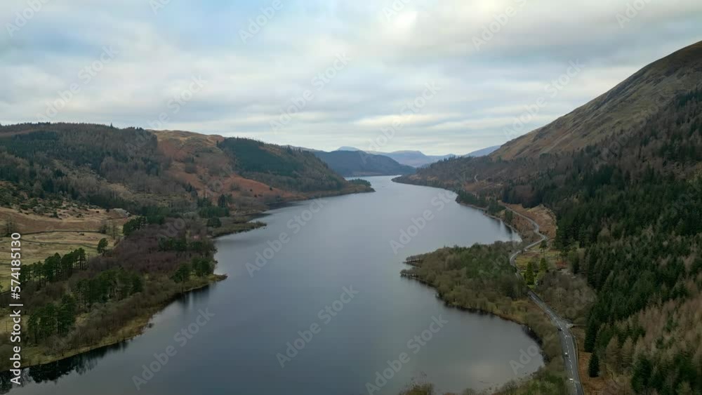 Cinematic view of Thirlmere lake in Cumbria. the lake has a magical, almost otherworldly atmosphere, thanks to its isolated location. Cinematic view of Thirlmere lake in Cumbria. the lake has a magical, almost otherworldly atmosphere, thanks to its isolated location.
