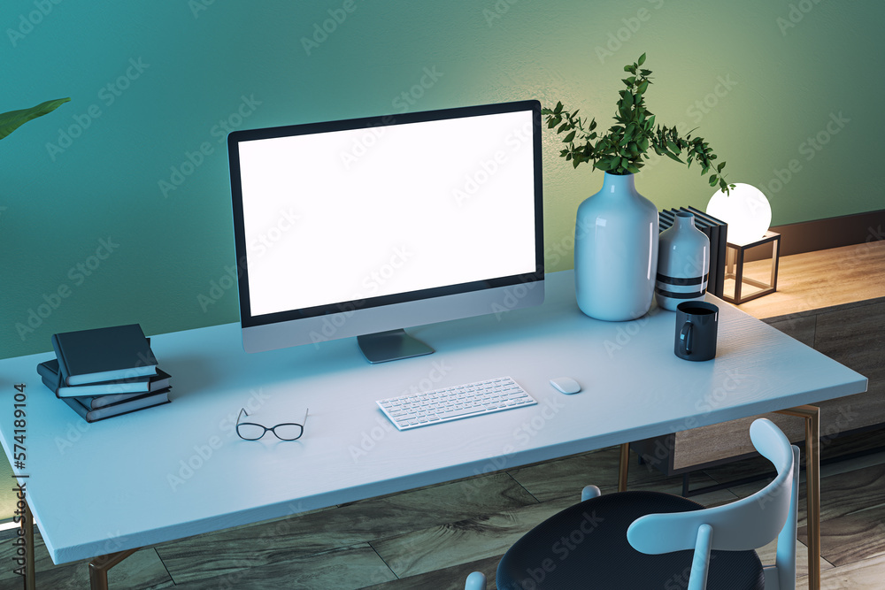 Modern designer office interior with empty computer monitor, white desk, various items, coffee cup and blue wall background. 3D Rendering. Modern designer office interior with empty computer monitor, white desk, various items, coffee cup and blue wall background. 3D Rendering.