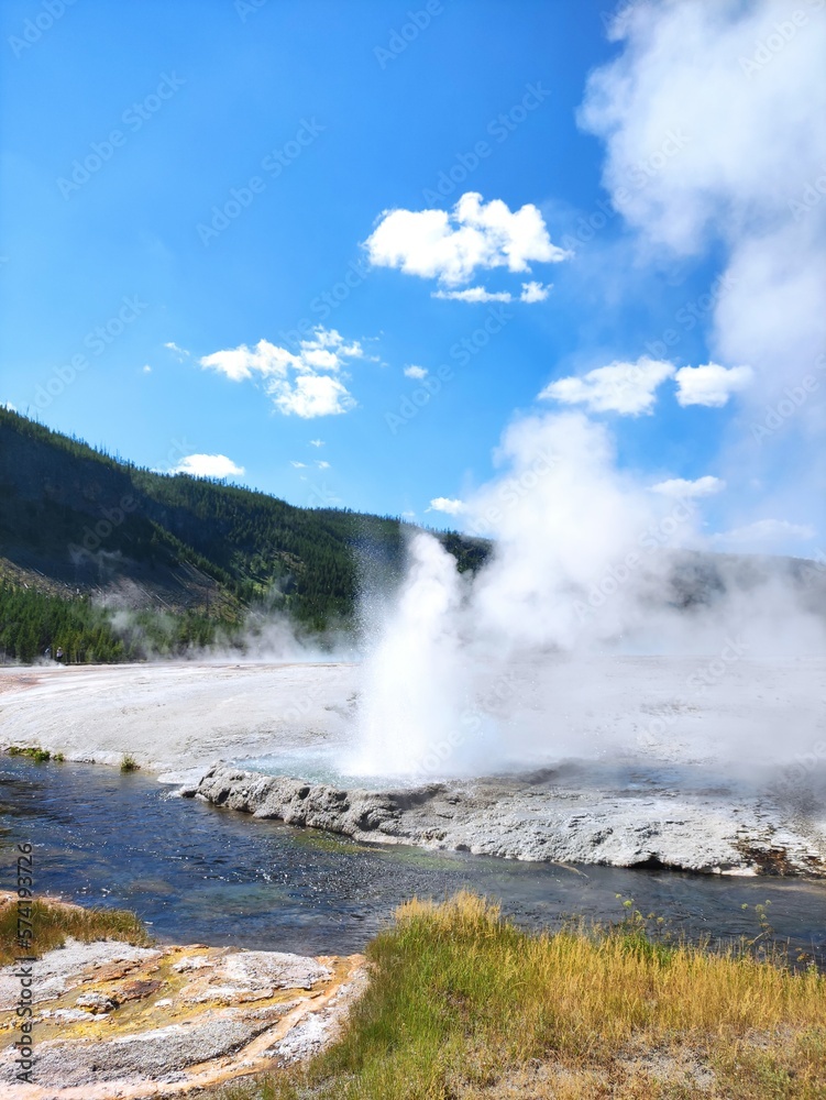 geyser's eruption in yellowstone park geyser's eruption in yellowstone park