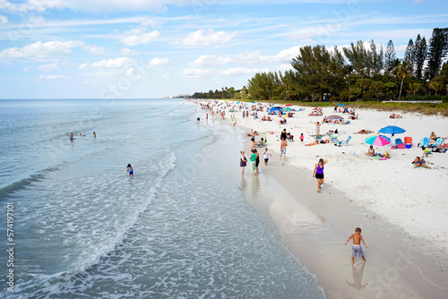 People enjoying beach, Naples, Florida, USA photo