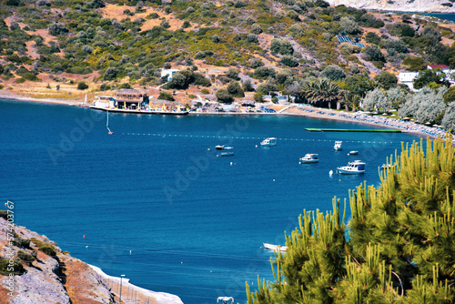 Fototapeta Naklejka Na Ścianę i Meble -  The view of Canak bay in Foca Izmir, one of the magnificent famous bays of Foca-Izmir, the boats and peninsulas in front of it.