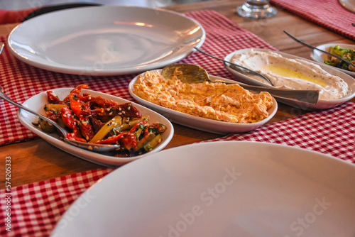 Aegean appetizers in small plates on the table at restaurant
