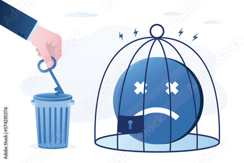 Bad mood and negative emotions closed in cage. Human hand throw key in trash can. Positive thinking, good mood helps to live and work. Negative emoji in birdcage.