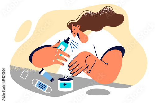 Vigilant woman uses antiseptic containing alcohol to sanitize hands after walk or going to store