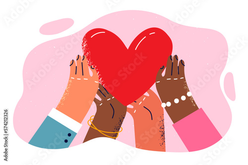 Hands people of different races and nationalities reach for heart symbolizing mercy and charity