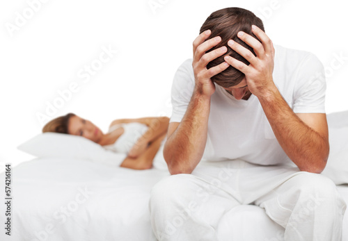 Portrait of unhappy young beautiful heterosexual couple in bedroom photo
