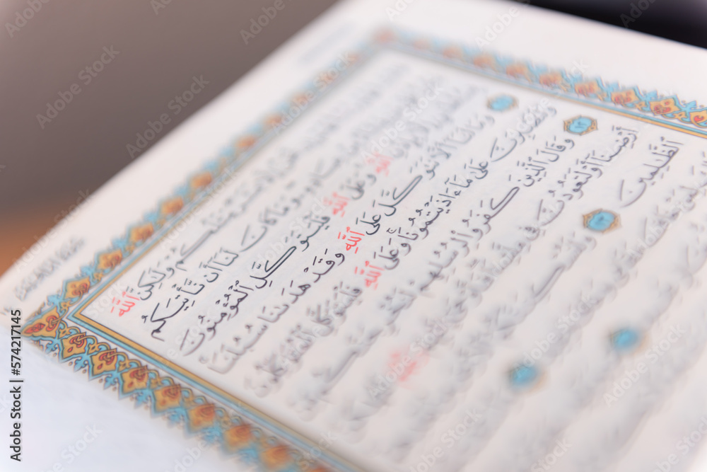 Sarajevo, Bosnia and Herzegovina, 20th february 2023; Muslim beads and Koran or Qoran on wooden table. Islamic religion concept. Sarajevo, Bosnia and Herzegovina, 20th february 2023; Muslim beads and Koran or Qoran on wooden table. Islamic religion concept.