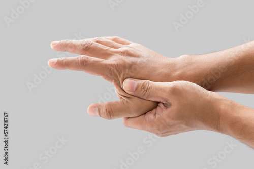 Fotografia A man grab hand palm because the hand palm was injured