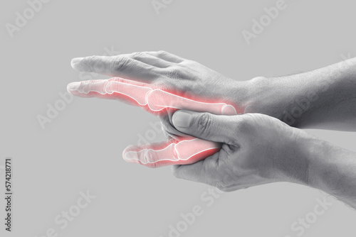 Man having bone pain in index finger and thumb. photo
