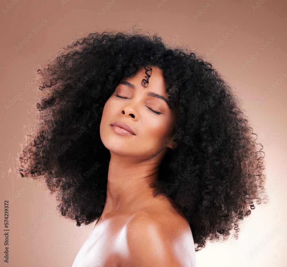 Natural hair, black woman with face and haircare, beauty with skincare and cosmetics on studio background. Female, cosmetic treatment and content with curly hairstyle, texture and afro with skin glow Natural hair, black woman with face and haircare, beauty with skincare and cosmetics on studio background. Female, cosmetic treatment and content with curly hairstyle, texture and afro with skin glow