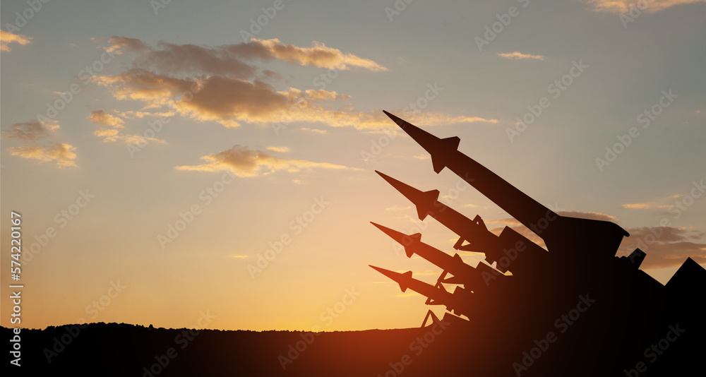 The missiles are aimed to the sky at sunset. Nuclear bomb, chemical weapons, missile defense, a system of salvo fire. The missiles are aimed to the sky at sunset. Nuclear bomb, chemical weapons, missile defense, a system of salvo fire.