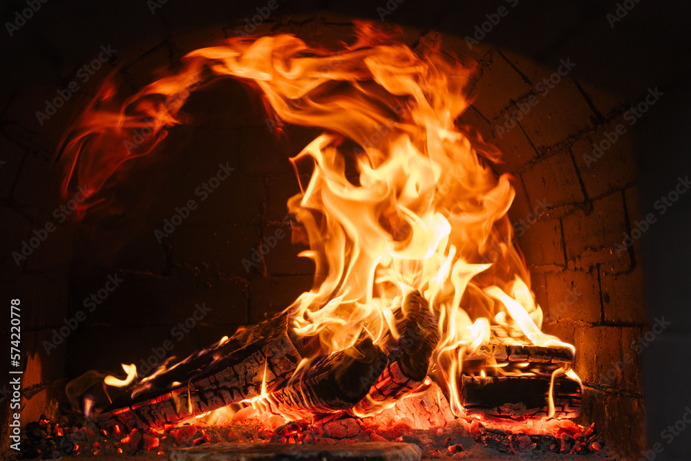 Heat energy closeup. red and yellow fire in oven Heat energy closeup. red and yellow fire in oven
