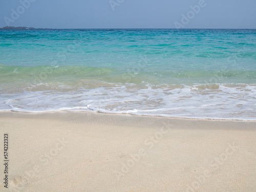 beach with white sand and waves