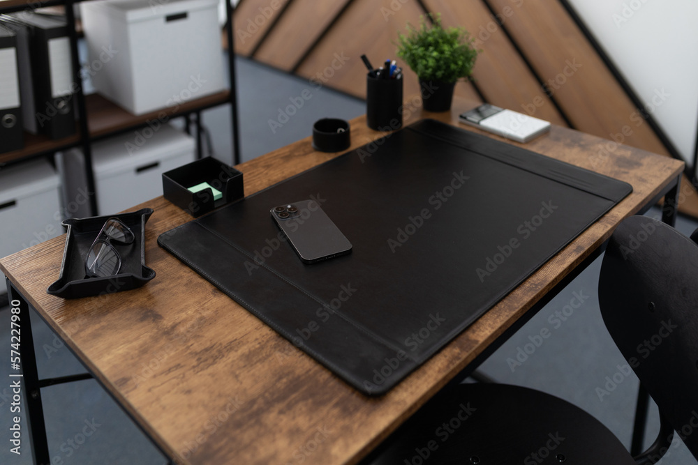 a workplace with a leather sofa and move a chair there a workplace with a leather sofa and move a chair there