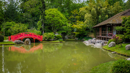 The Japanese garden of Toulouse, in Compans Caffarelli, with its lake, traditional building and red bridge photo