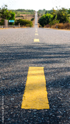 Photo for Affirmation about goal and right way. Never Stop Motivational. Beautiful view of empty asphalt road yellow line mountain nature