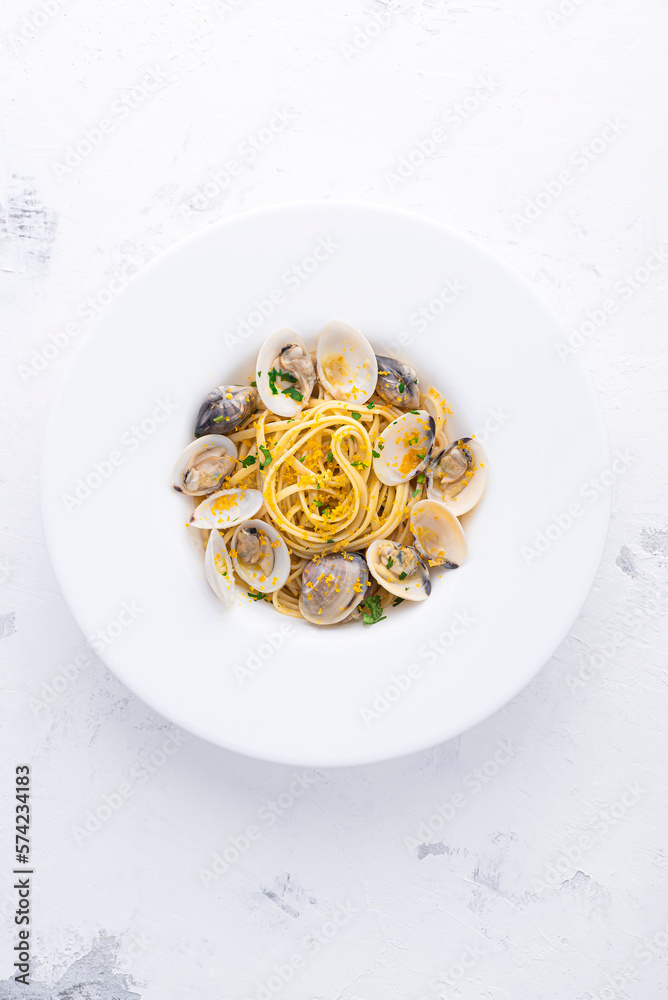 Spaghetti pasta with clams (vongole) and bottarga (dried tuna or mullet