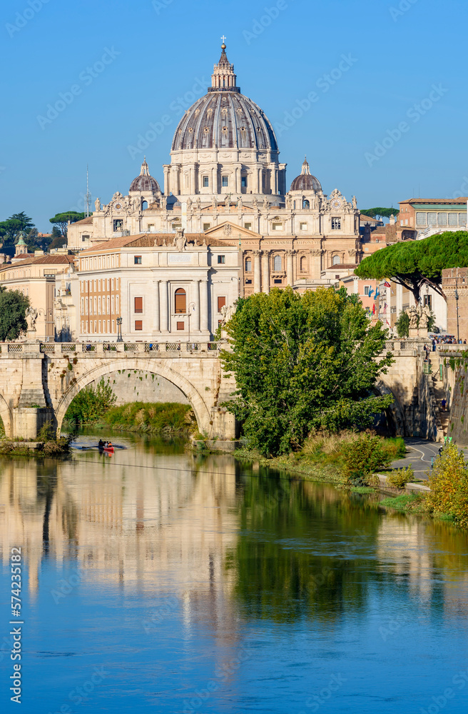 St Peter's basilica in Vatican and St. Angel bridge over Tiber, Rome, Italy