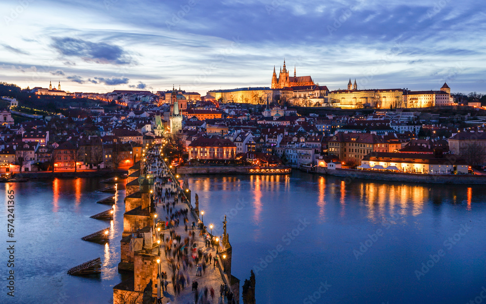 Naklejka premium Historic Prague sunset aerial panorama with Prague Castle and Charles Bridge, popular tourist destination
