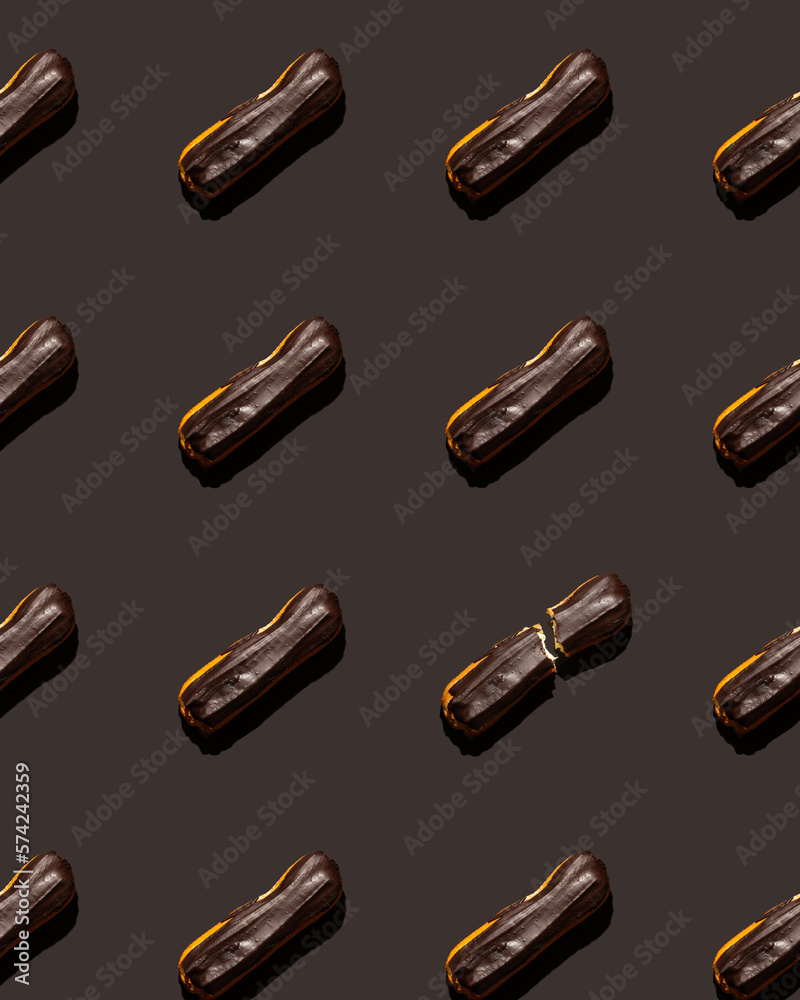 Eclair pattern with dark brown background Eclair pattern with dark brown background