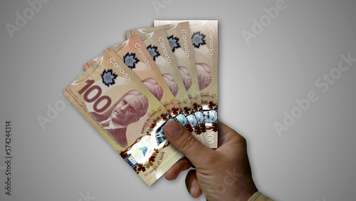 Canada Dollar growing pile of money in hand concept 3d illustration