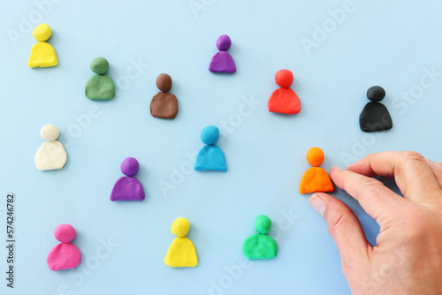 Group of colorful figures over blue background