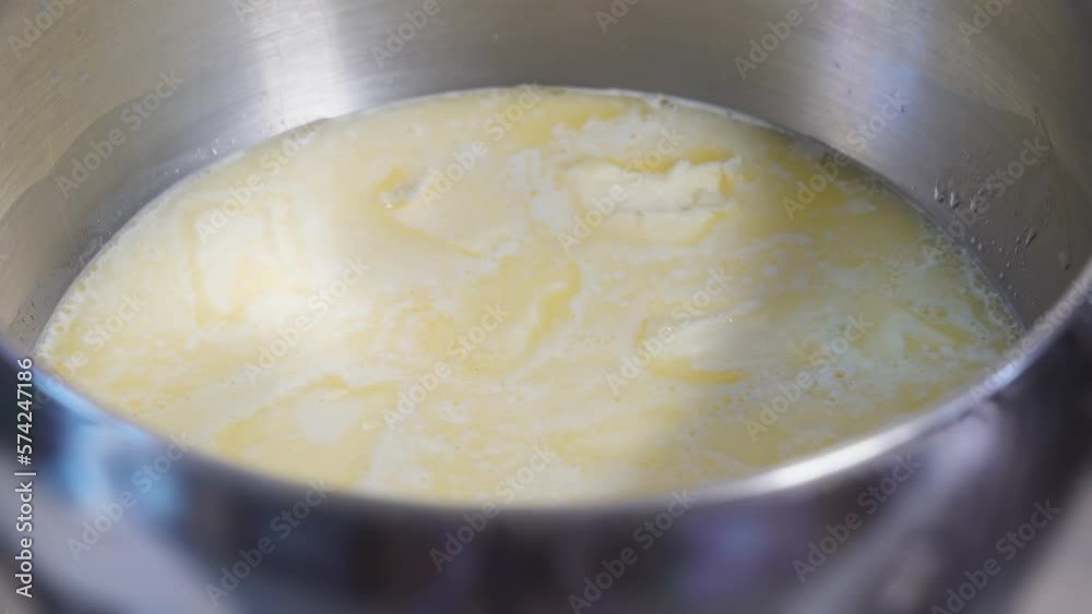 Butter is dissolved in hot chocolate Butter is dissolved in hot chocolate
