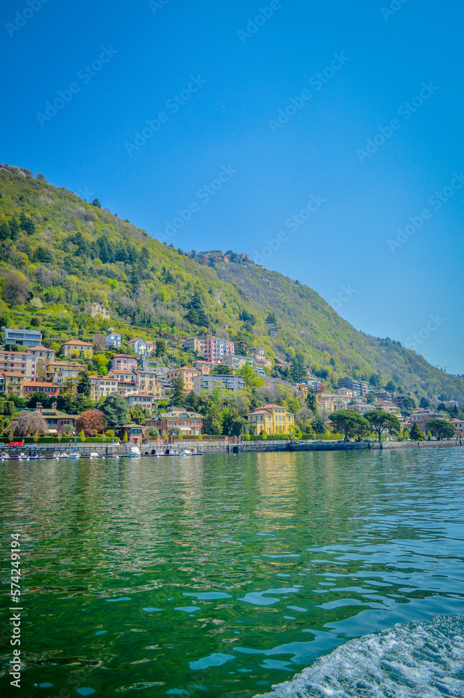 Spring in Italy, Lombardy, Milano, Como lake and city. Landscape view on hills, park, old town and water, with some interesting details, close up and panoramic. Spring in Italy, Lombardy, Milano, Como lake and city. Landscape view on hills, park, old town and water, with some interesting details, close up and panoramic.