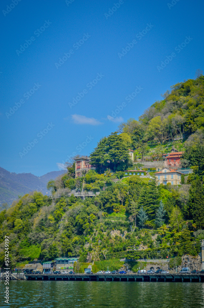 Spring in Italy, Lombardy, Milano, Como lake and city. Landscape view on hills, park, old town and water, with some interesting details, close up and panoramic.