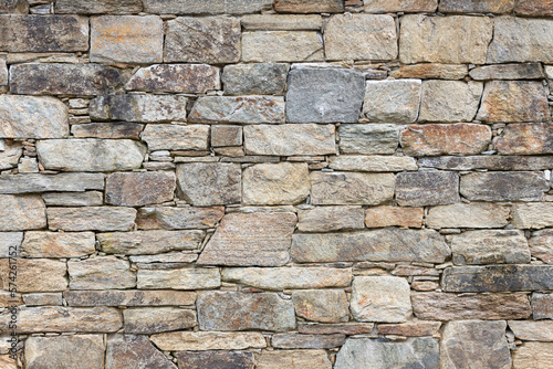 Dry masonry Stone wall background texture