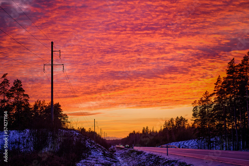 red sky clouds sunset sunrise over the road