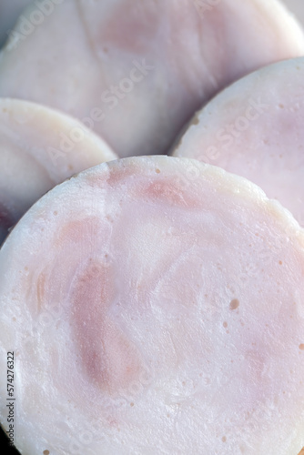 Sliced round-shaped ham from chicken meat