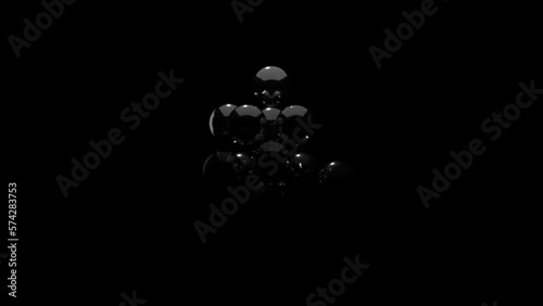 metal balls moving against a black and white background
