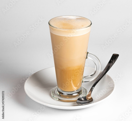 Coffee latte cafe tall long glass white background whipped cream milk barisa spoon plate coffeeshop offer clean