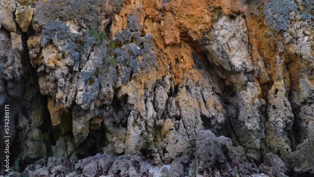 Details of the rocks of the Berria beach at sunset near the town of Santoña. Natural Park of the Marshes of Santoña, Victoria, Noja and Joyel. Cantabrian Sea. Cantabria. Spain. Europe Details of the rocks of the Berria beach at sunset near the town of Santoña. Natural Park of the Marshes of Santoña, Victoria, Noja and Joyel. Cantabrian Sea. Cantabria. Spain. Europe